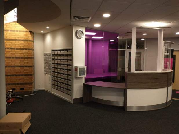 Picture of reception counter and built in pigeonholes